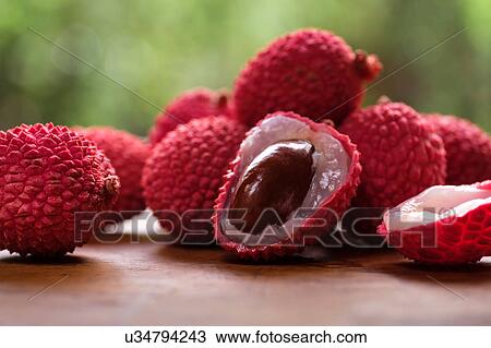 Stock Image - Lychee on table. Fotosearch