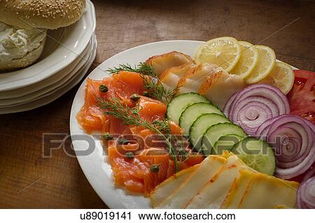 Stock Image - Plate with vegetables and whitefish. Fotosearch