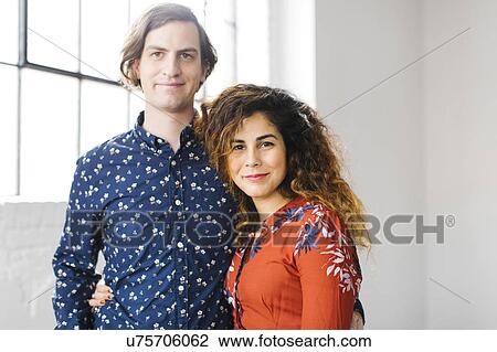Portrait of couple against window View Large Photo Image Stock Image - Portrait of couple against window. Fotosearch