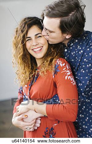 Picture - Portrait of kissing couple. Fotosearch
