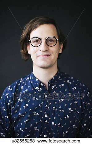 Stock Photo - Portrait of man with glasses. Fotosearch
