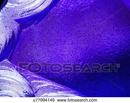 Stock Photo - Purple backlit glass. Fotosearch