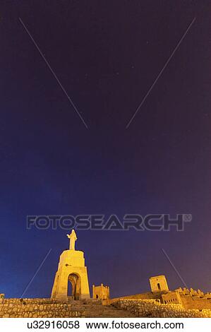 Spain, Andalusia, Almeria, Statue of Sacred Heart of Jesus at dusk View Large Photo Image Stock Photo - Spain, Andalusia, Almeria, Statue of Sacred Heart of Jesus at dusk. Fotosearch