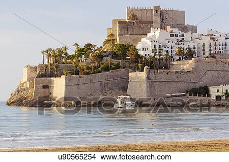 Picture - Spain, Valencian Community, Peniscola, Town with fortified wall by sea. Fotosearch