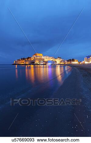 Stock Image - Spain, Valencian Community, Peniscola, Moody sky over Peniscola. Fotosearch