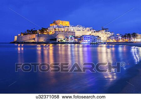 Spain, Valencian Community, Peniscola, Moody sky over Peniscola View Large Photo Image Stock Photo - Spain, Valencian Community, Peniscola, Moody sky over Peniscola. Fotosearch