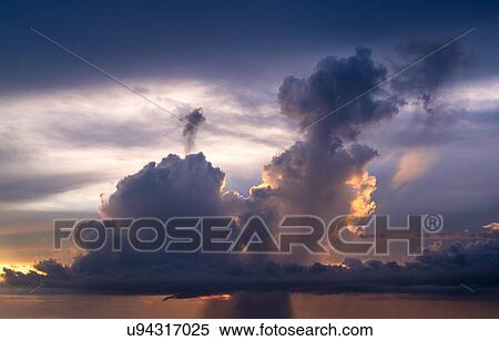 Storm cloud at sunset View Large Photo Image Stock Photography - Storm cloud at sunset. Fotosearch