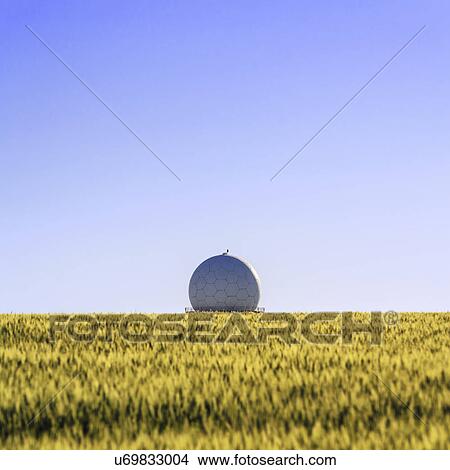 Picture - Ukraine, Dnepropetrovsk region, Dnepropetrovsk city, Radar in middle of field of wheat. Fotosearch