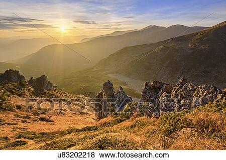 Stock Photo - Ukraine, Ivano-Frankivsk region, Verkhovyna district, Carpathians, Chornohora, Sunrise over mountain Shpytsi. Fotosearch