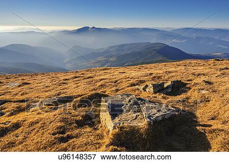 Stock Photo - Ukraine, Zakarpattia region, Rakhiv district, Carpathians, Chornohora, Mountain landscape with mountain Hoverla and mountain Petros. Fotosearch