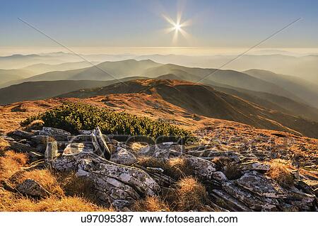 Stock Photo - Ukraine, Zakarpattia region, Rakhiv district, Carpathians, Chornohora, mountain Petros, Fog over mountain range. Fotosearch