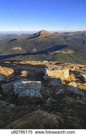 Stock Photography - Ukraine, Zakarpattia region, Rakhiv district, Carpathians, Chornohora, Mountain landscape with mountain Hoverla and mountain Petros. Fotosearch