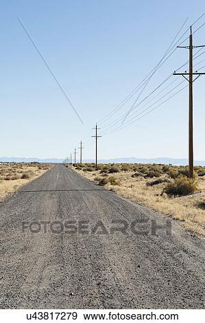 USA, Nevada, Highway 50, Electricity pylons next to road View Large Photo Image Stock Photo - USA, Nevada, Highway 50, Electricity pylons next to road. Fotosearch