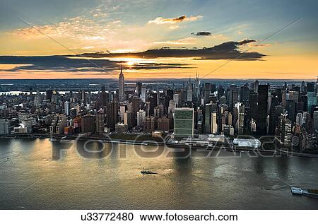 USA, New York, New York City, City at sunset View Large Photo Image Stock Image - USA, New York, New York City, City at sunset. Fotosearch