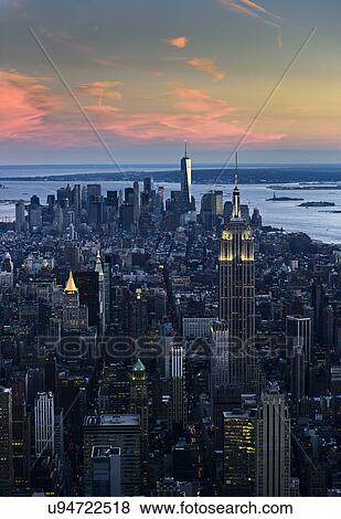 Stock Photo - USA, New York, New York City, City at dusk. Fotosearch