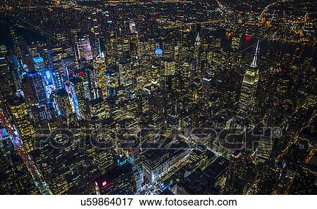 Stock Photo - USA, New York, New York City, City lights at night. Fotosearch