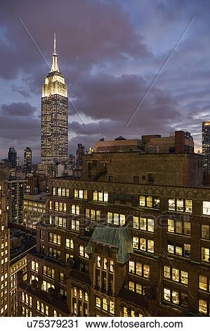 USA, New York, New York City, Empire State Building in background at night View Large Photo Image Stock Image - USA, New York, New York City, Empire State Building in background at night. Fotosearch