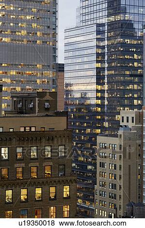 USA, New York, New York City, Reflections on skyscraper View Large Photo Image Stock Photo - USA, New York, New York City, Reflections on skyscraper. Fotosearch