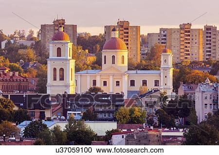 Stock Image - Vilnius, Lithuania, Cityscape at sunrise. Fotosearch