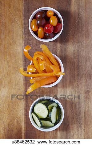 Yellow pepper, tomatoes and cucumber View Large Photo Image Stock Image - Yellow pepper, tomatoes and cucumber. Fotosearch