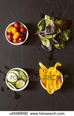 Yellow pepper, tomatoes, cucumber and greens View Large Photo Image Stock Image - Yellow pepper, tomatoes, cucumber and greens. Fotosearch