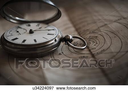Stock Photo - Antique watch on diagram. Fotosearch