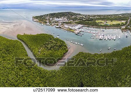 Australia, Queensland, Aerial view of coastline with harbor View Large Photo Image Stock Photo - Australia, Queensland, Aerial view of coastline with harbor. Fotosearch