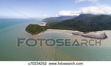 Stock Image - Australia, Queensland, Blue sky over coralline. Fotosearch