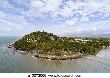 Stock Photograph - Australia, Queensland, Blue sky over coastline. Fotosearch
