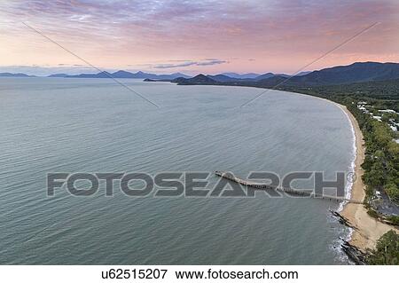 Stock Photo - Australia, Queensland, Coast at dusk. Fotosearch