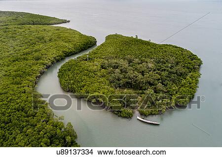 Australia, Queensland, Green island next to coastline View Large Photo Image Picture - Australia, Queensland, Green island next to coastline. Fotosearch