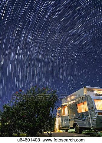 Australia, Queensland, Night sky over camper trailer View Large Photo Image Stock Photo - Australia, Queensland, Night sky over camper trailer. Fotosearch