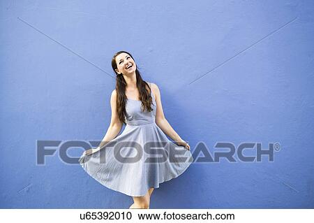 Beautiful happy woman dancing View Large Photo Image Stock Image - Beautiful happy woman dancing. Fotosearch