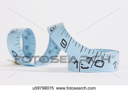 Stock Photography - Blue measuring tape on white background. Fotosearch