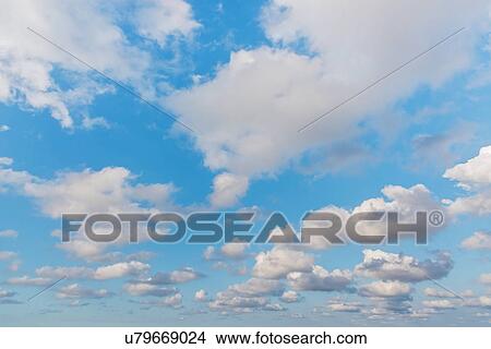 Picture - Blue sky with white clouds. Fotosearch