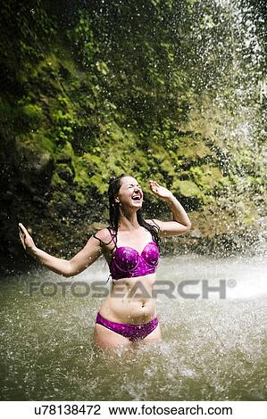 Caribbean, Saint Lucia, Woman wading in pond View Large Photo Image Stock Image - Caribbean, Saint Lucia, Woman wading in pond. Fotosearch