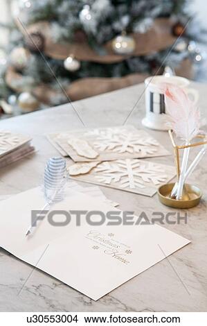 Christmas card on desk View Large Photo Image Picture - Christmas card on desk. Fotosearch