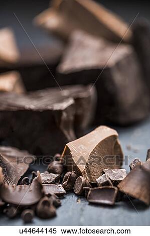 Close-up of chocolate pieces View Large Photo Image Stock Photography - Close-up of chocolate pieces. Fotosearch