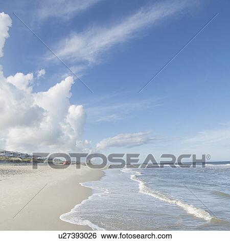 Clouds above beach and sea View Large Photo Image Stock Photograph - Clouds above beach and sea. Fotosearch