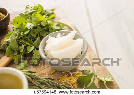 Coconut oil in bowl View Large Photo Image Stock Photo - Coconut oil in bowl. Fotosearch