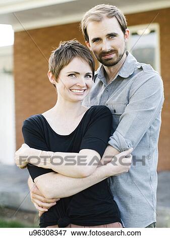Couple looking at camera View Large Photo Image Stock Photo - Couple looking at camera. Fotosearch
