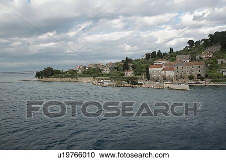 Stock Image - Croatia, Small town by sea. Fotosearch