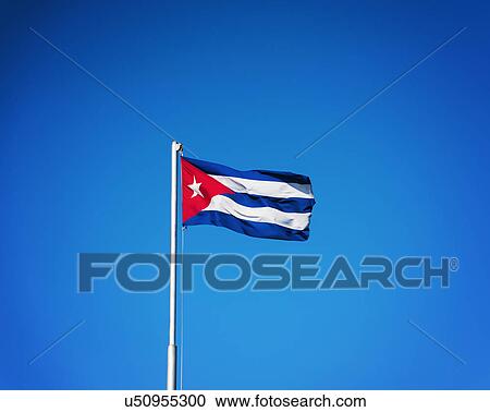 Cuba, Havana, Cuban flag with blue sky View Large Photo Image Stock Image - Cuba, Havana, Cuban flag with blue sky. Fotosearch
