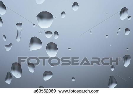 Drops on glass View Large Photo Image Stock Photo - Drops on glass. Fotosearch