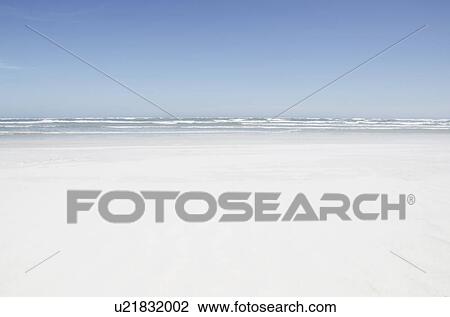 Stock Image - Empty sandy beach. Fotosearch