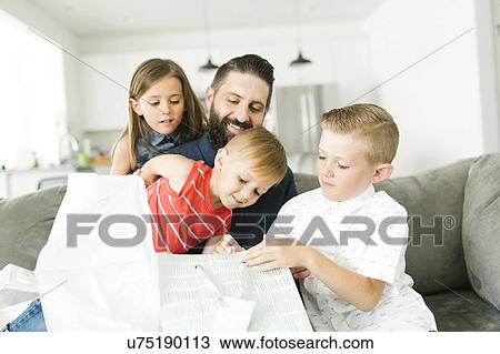 Family with three children (2-3, 6-7) celebrating fathers day View Large Photo Image Stock Image - Family with three children (2-3, 6-7) celebrating fathers day. Fotosearch
