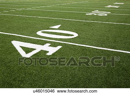Stock Photograph - Football field marking of 40 yard line. Fotosearch