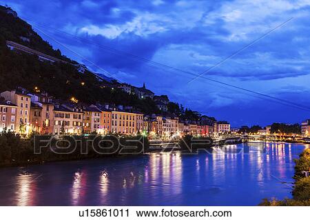 Stock Image - France, Auvergne-Rhone-Alpes, Grenoble, Grenoble architecture along Isere River. Fotosearch