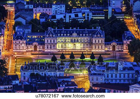 Stock Photo - France, Auvergne-Rhone-Alpes, Grenoble, Grenoble panorama at evening. Fotosearch