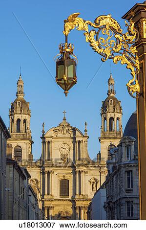 France, Grand Est, Nancy, Ornate street light with Nancy Cathedral in background View Large Photo Image Stock Photo - France, Grand Est, Nancy, Ornate street light with Nancy Cathedral in background. Fotosearch
